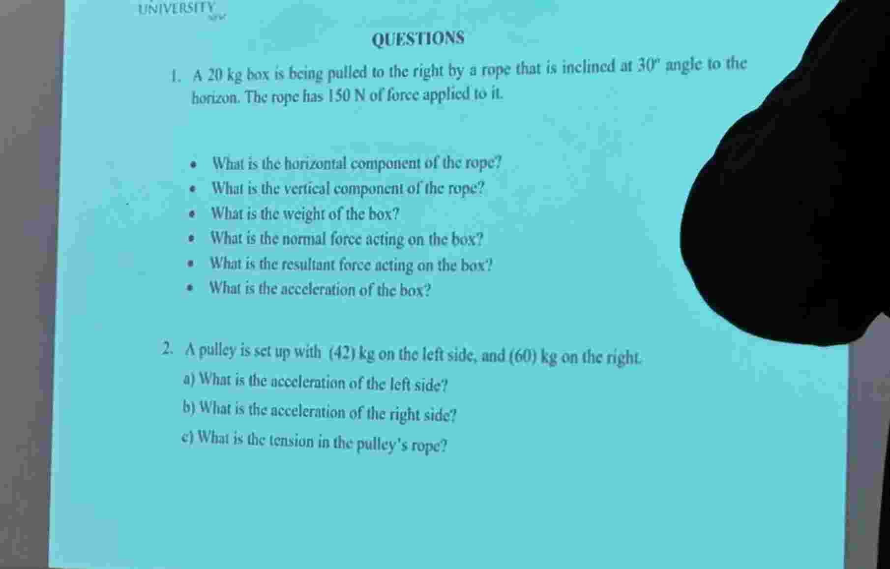 QUESTIONS 1 . A 2 0 kg box is being pulled to the