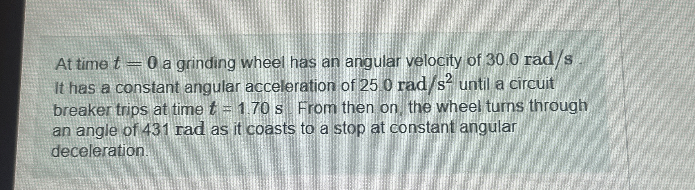 At time t = 0 a grinding wheel has an angular