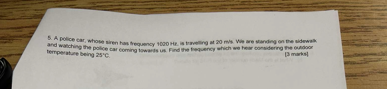 A police car, whose siren has frequency 1 0 2 0