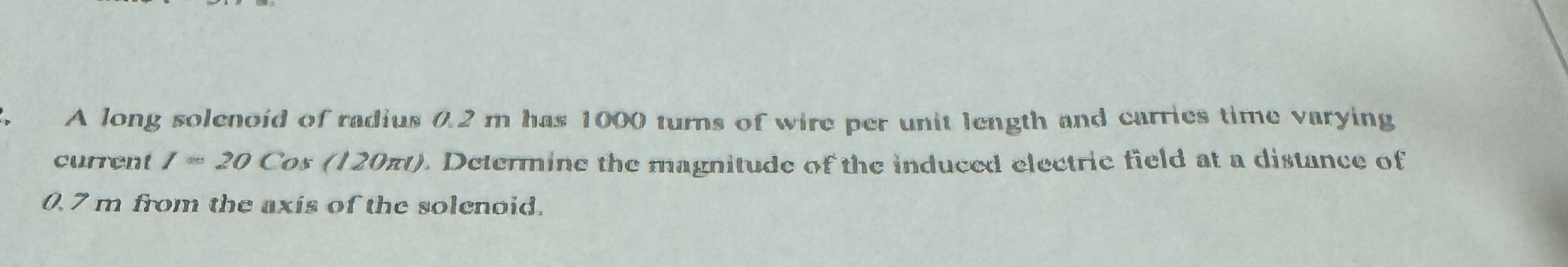 A long solenoid of radius 0 . 2 m hass 1 0 0 0