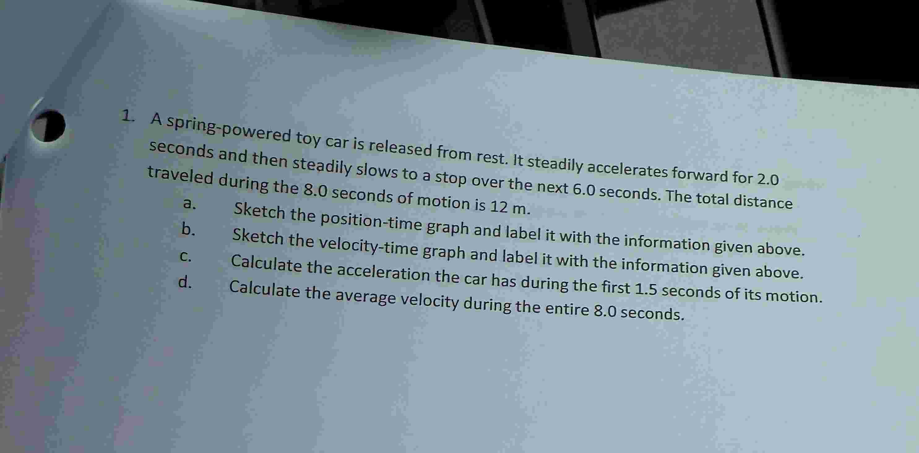A spring - powered toy car is released from rest.