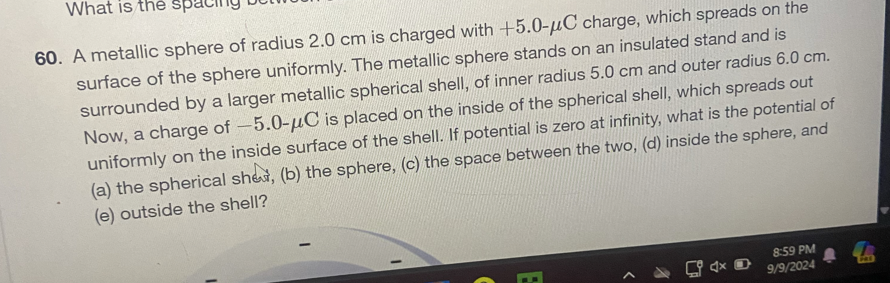 A metallic sphere of radius 2 . 0 cm is charged