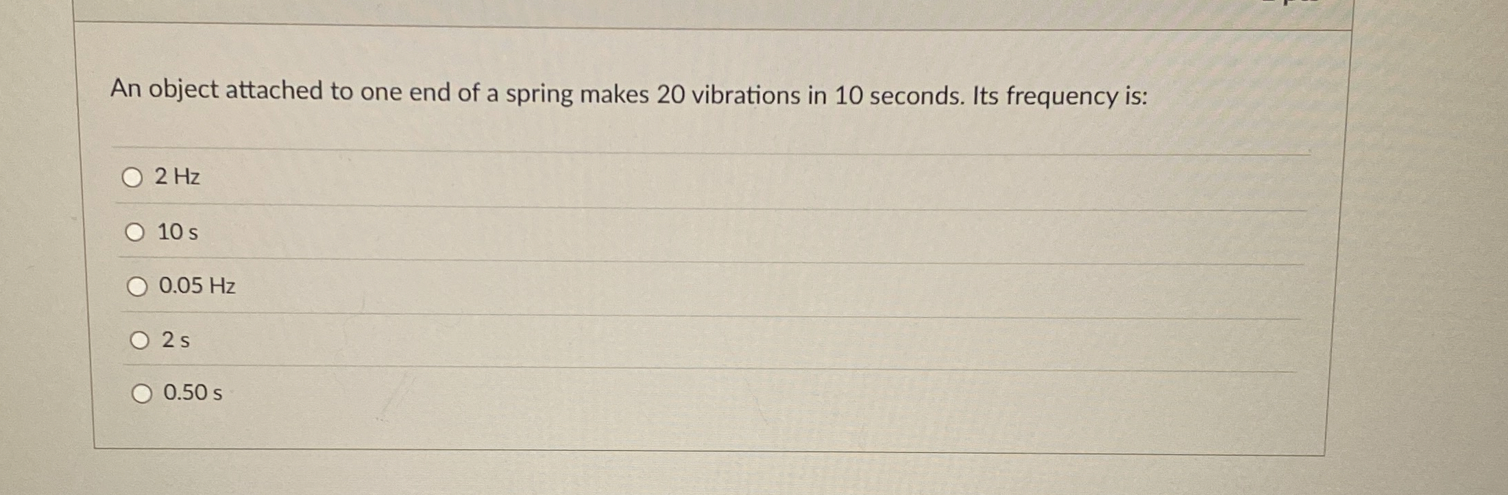 An object attached to one end of a spring makes 2