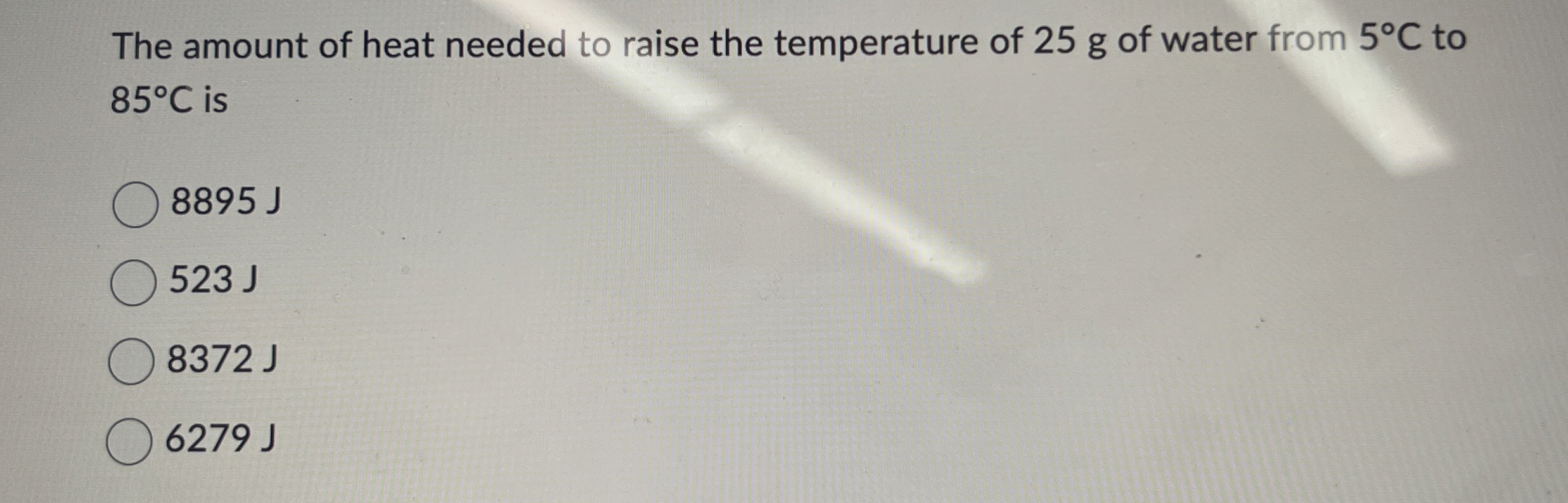 Compared to sea level, water in an open pot in