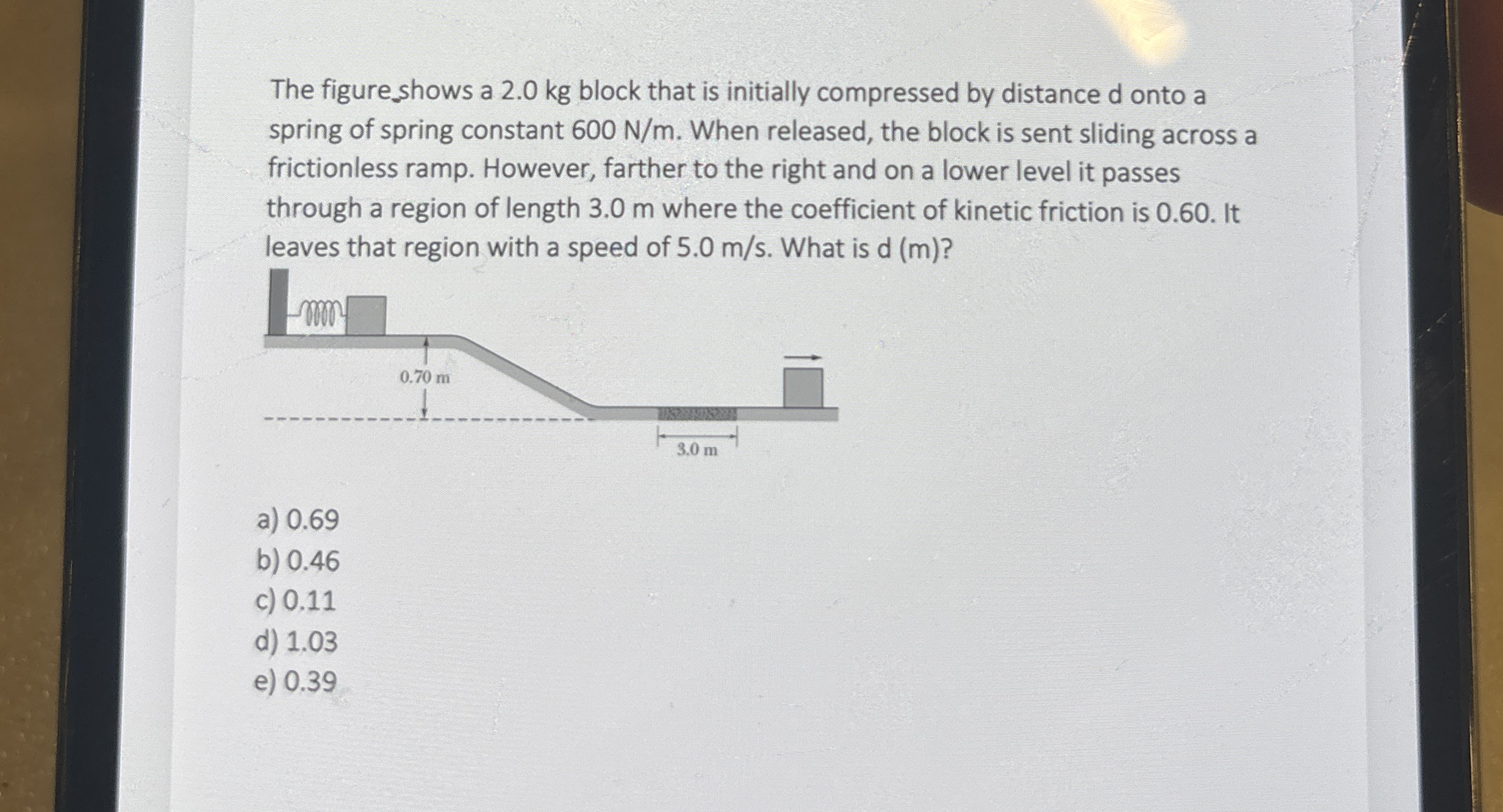 The figure _ shows a 2 . 0 kg block that is