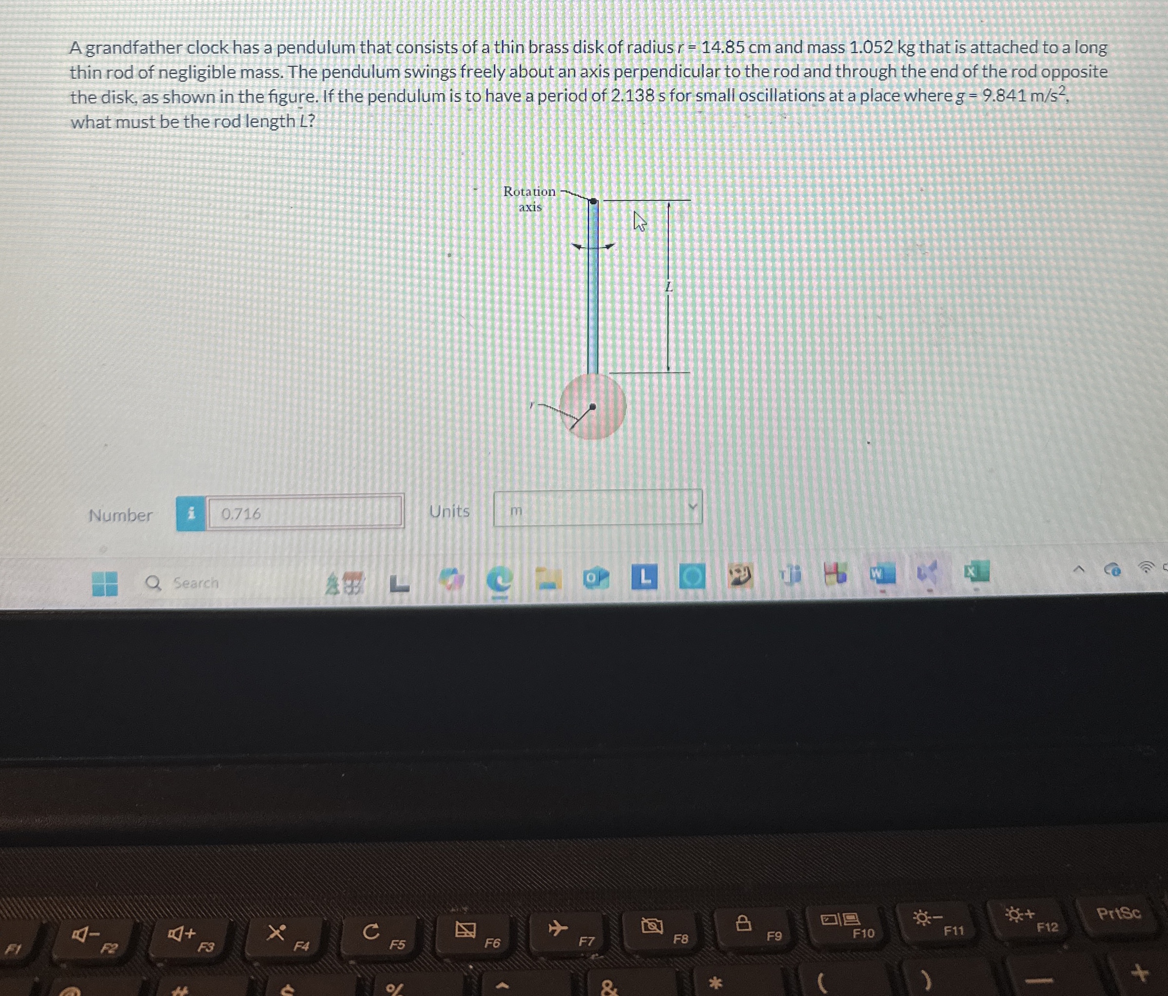 A grandfather clock has a pendulum that consists