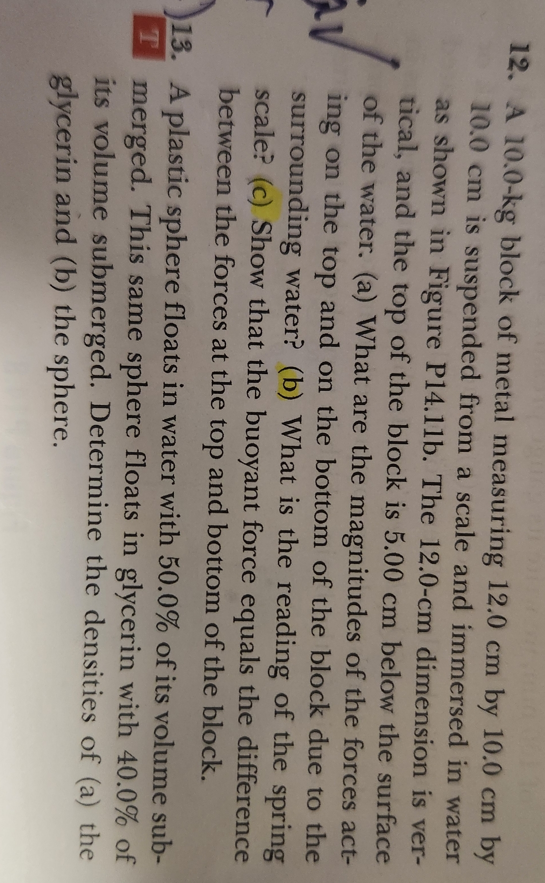 A 1 0 . 0 - k g block of metal measuring 1 2 . 0