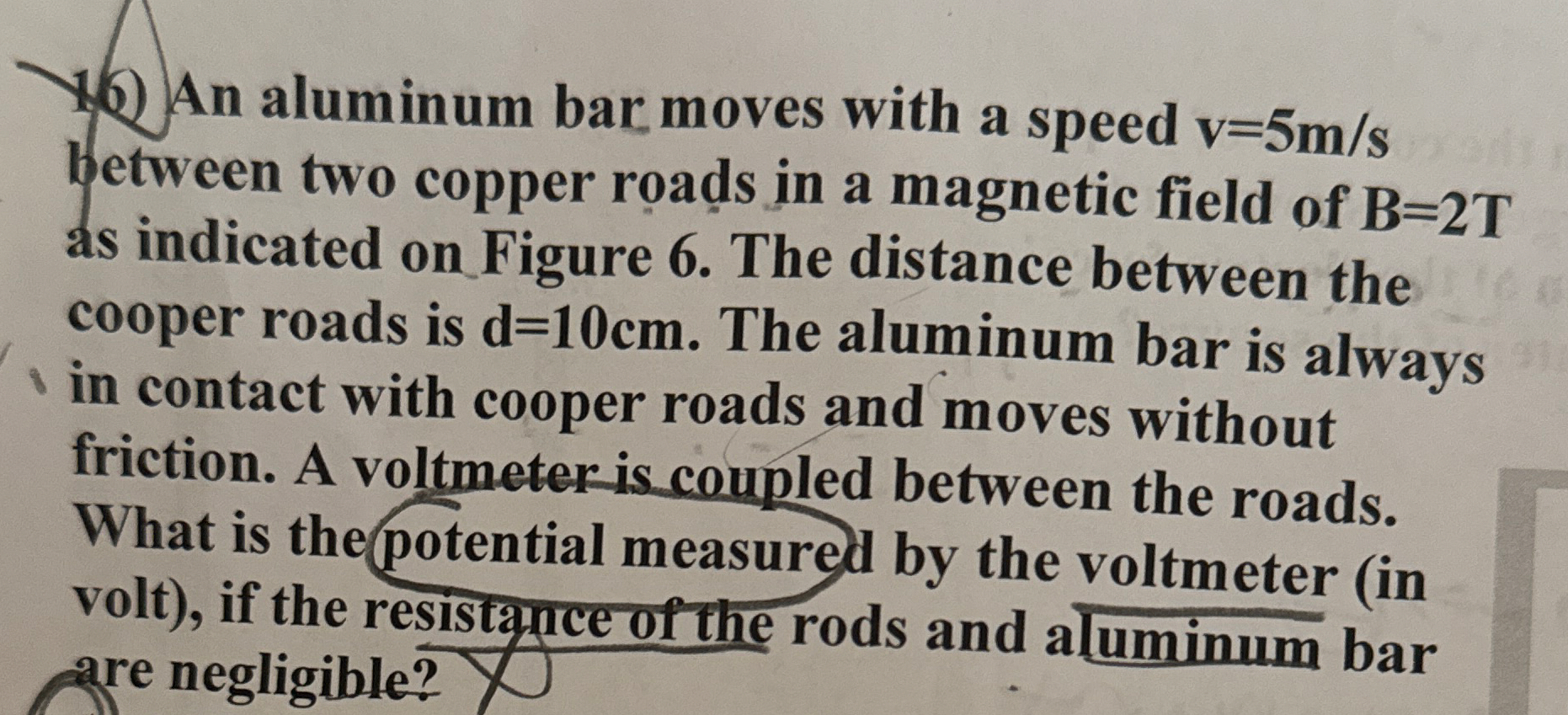 An aluminum bar moves with a speed v = 5 m s