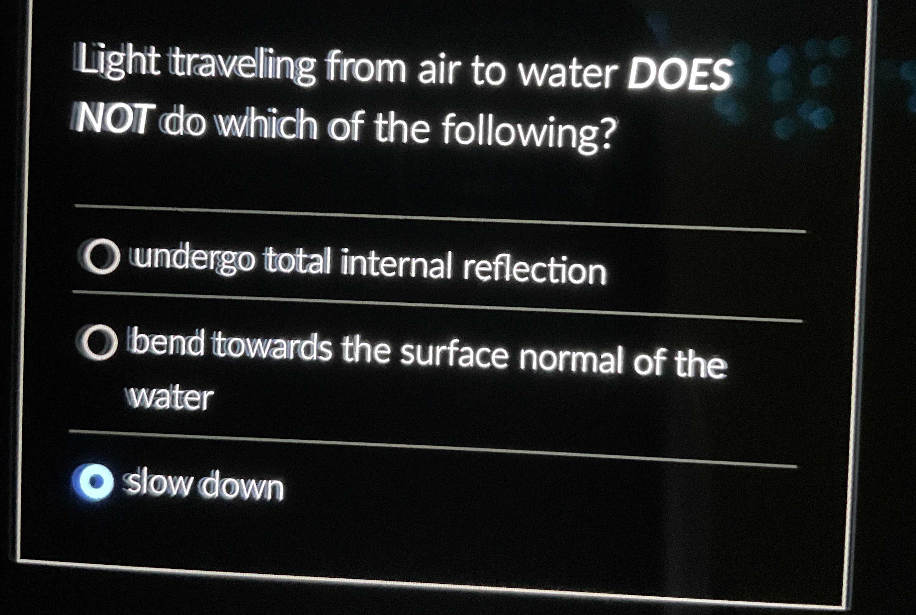 Light travelling from air to water DOES NOT do