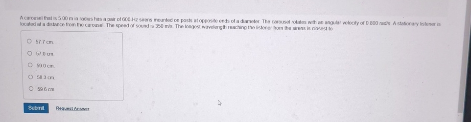 A carousel that is 5 . 0 0 m in radius has a pair