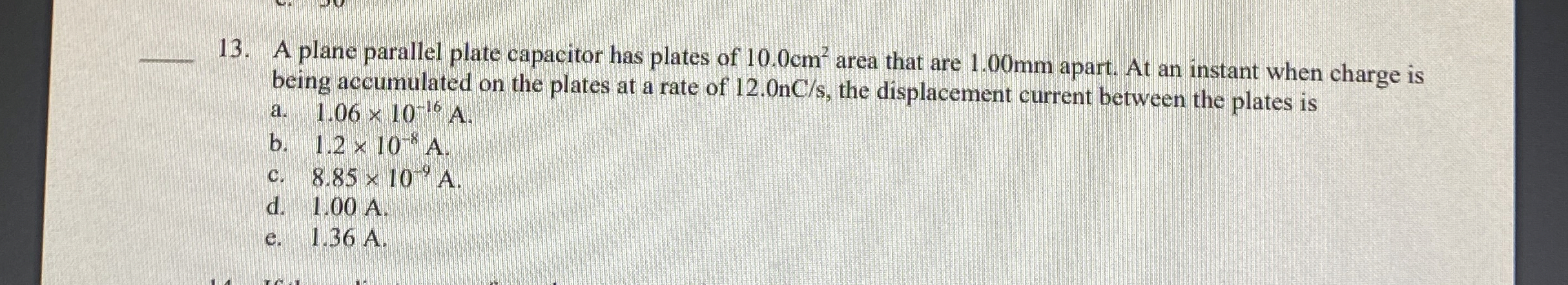 q , 1 3 . A plane parallel plate capacitor has