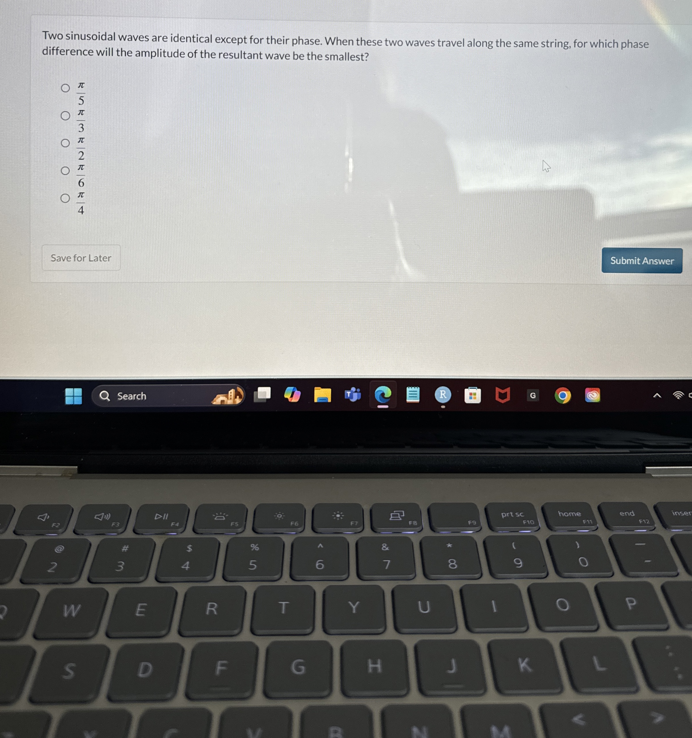 Two sinusoidal waves are identical except for