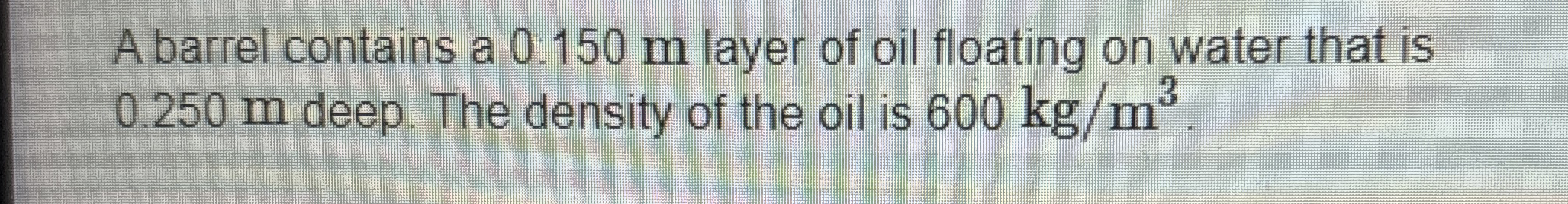 A barrel contains a 0 . 1 5 0 m layer of oil