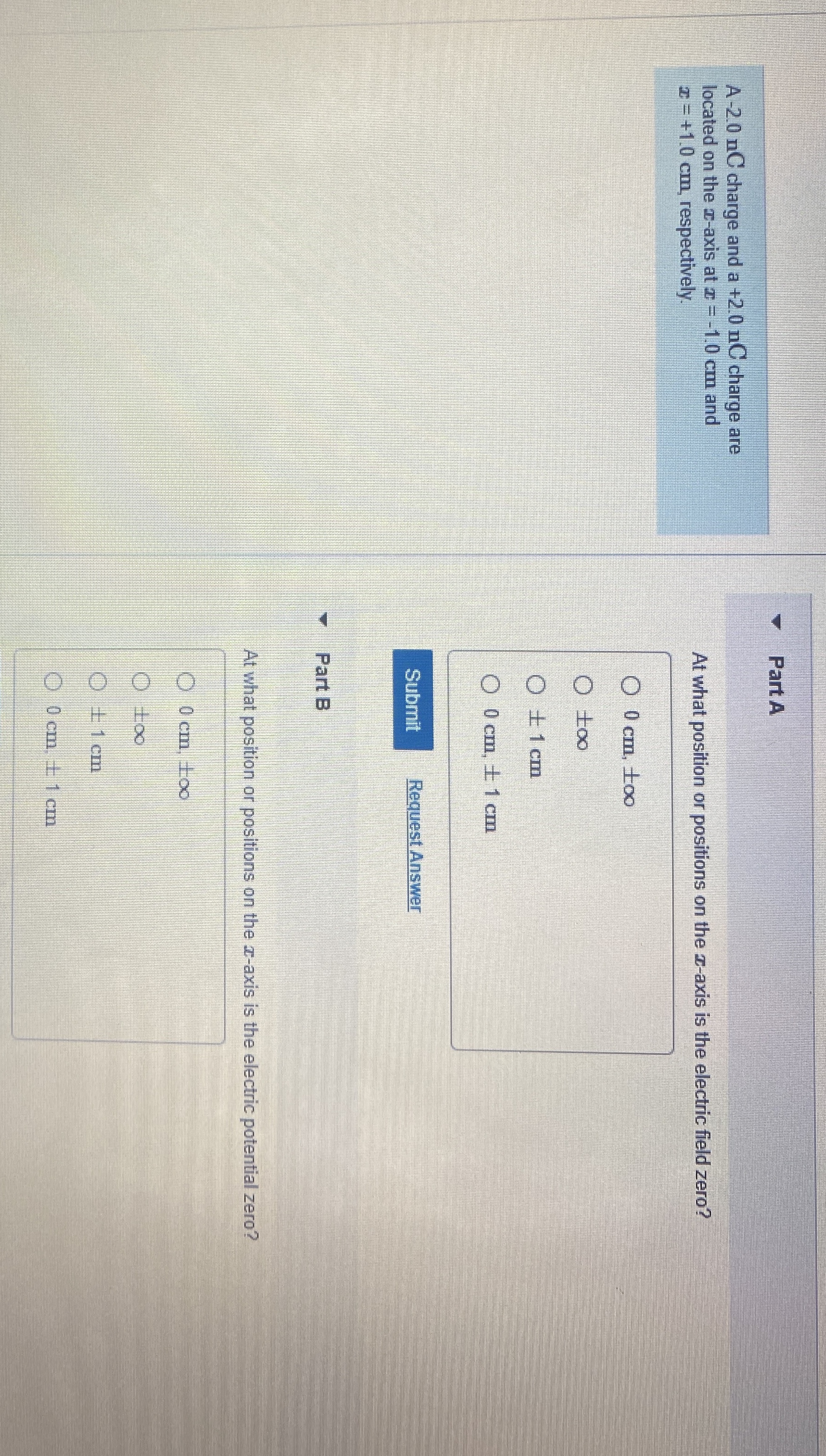 A - 2 . 0 nC charge and a + 2 . 0 n C charge are