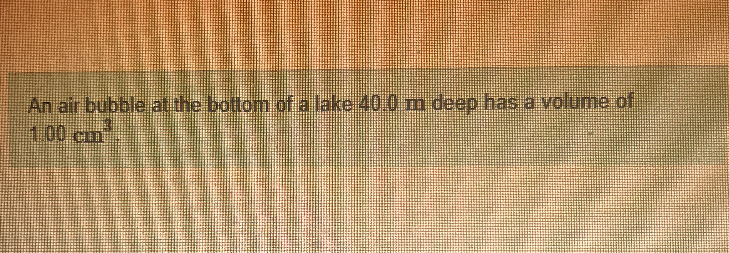 An air bubble at the bottom of a lake 4 0 . 0 m