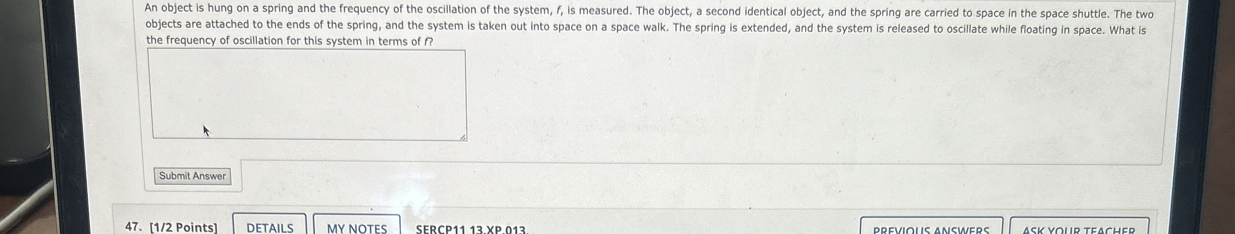 An object is hung on a spring and the frequency