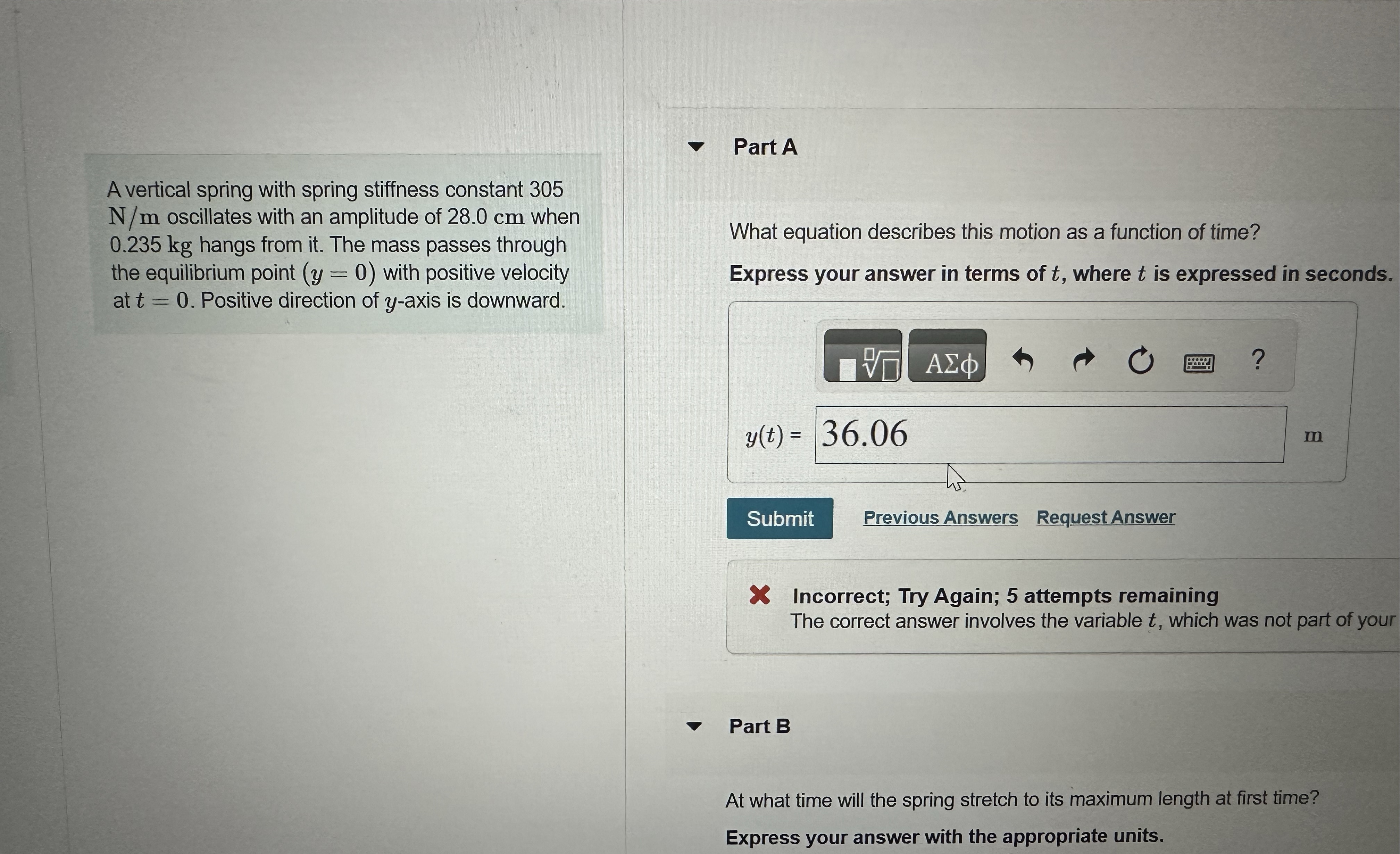 A vertical spring with spring stiffness constant