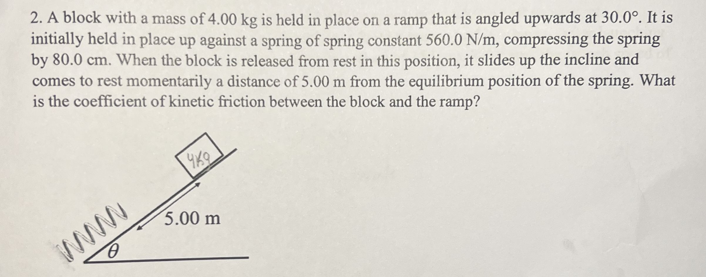 A block with a mass of 4 . 0 0 kg is held in