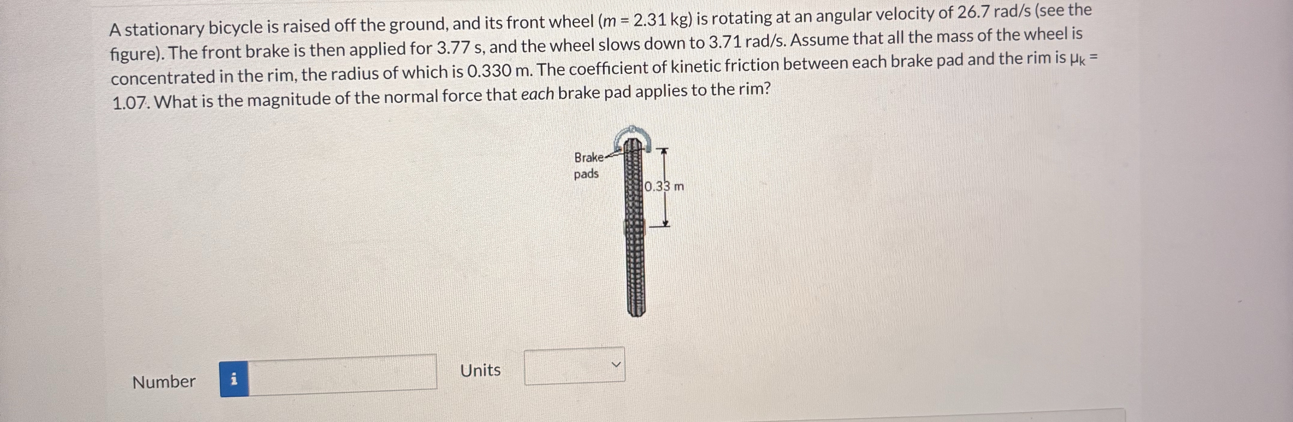 A stationary bicycle is raised off the ground,