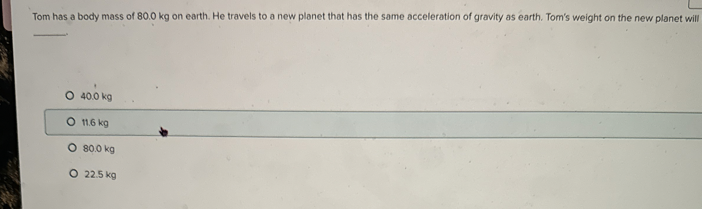 Tom has a body mass of 8 0 . 0 kg on earth. He
