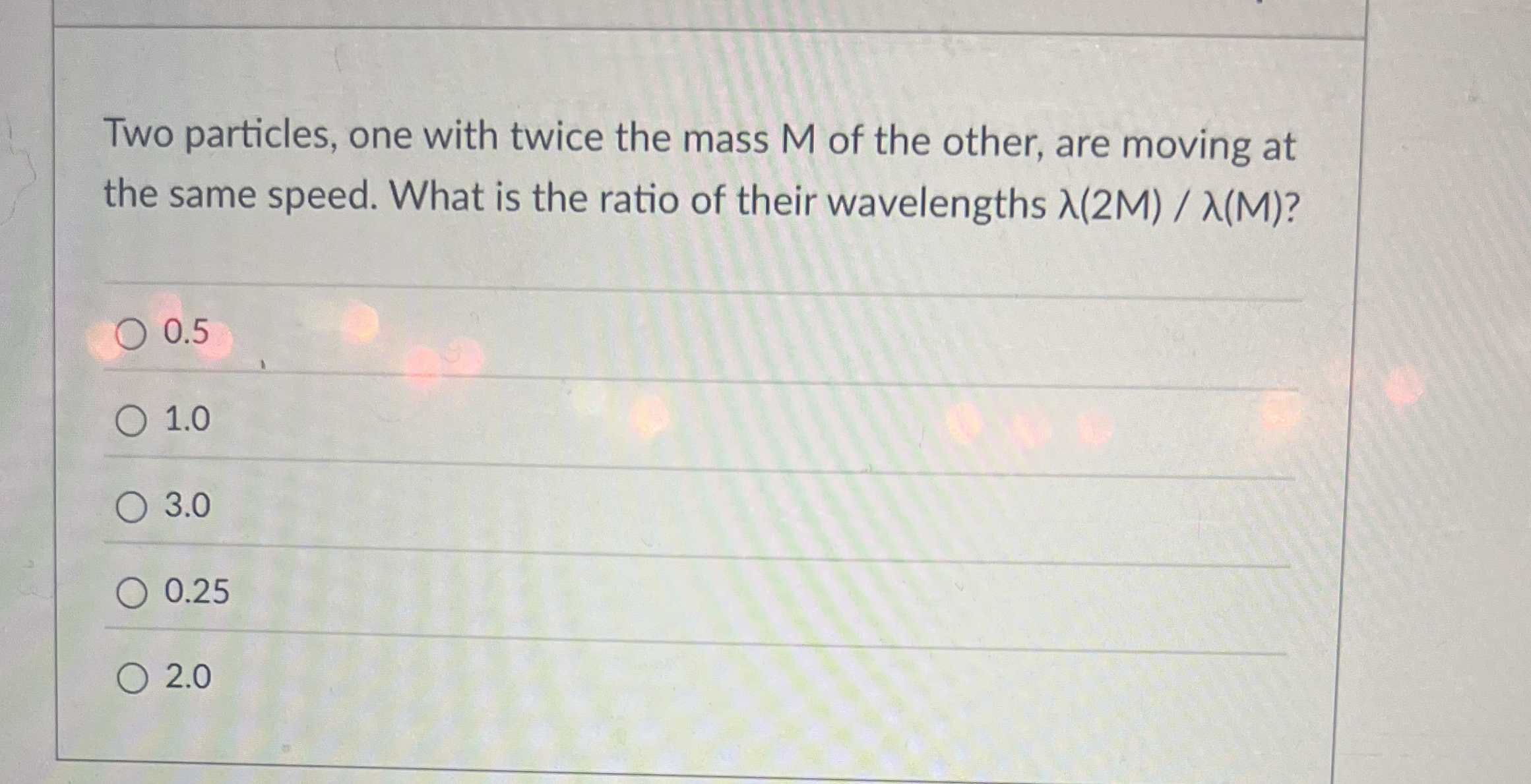 Two particles, one with twice the mass M of the