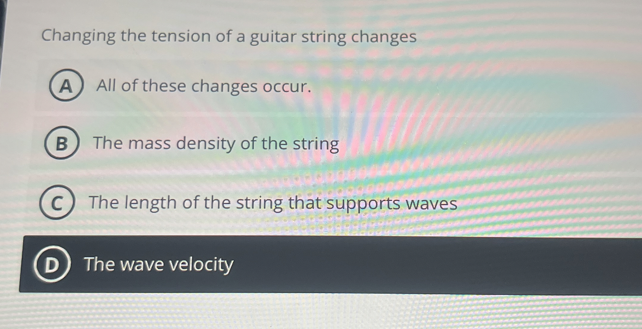 Changing the tension of a guitar string changes