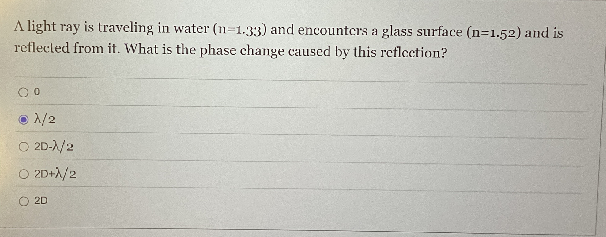 A light ray is traveling in water ) = ( 1 . 3 3