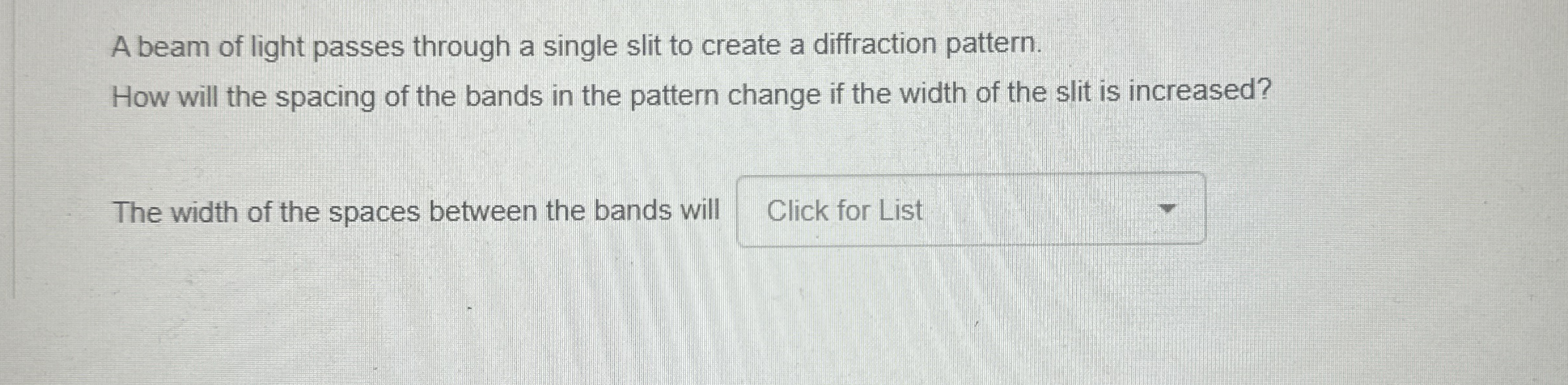 A beam of light passes through a single slit to