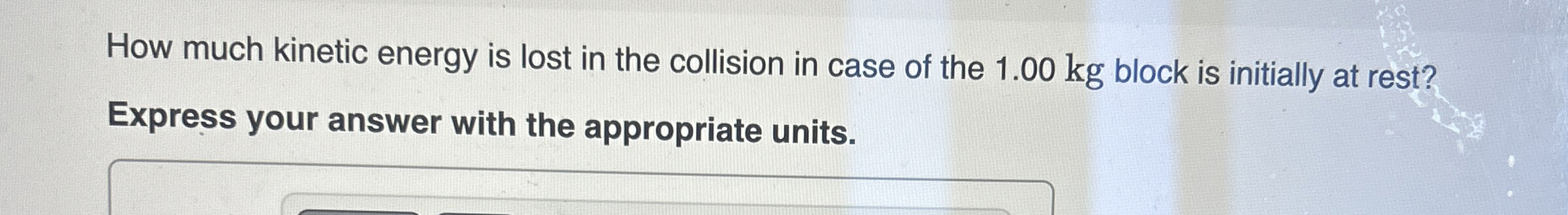 How much kinetic energy is lost in the collision