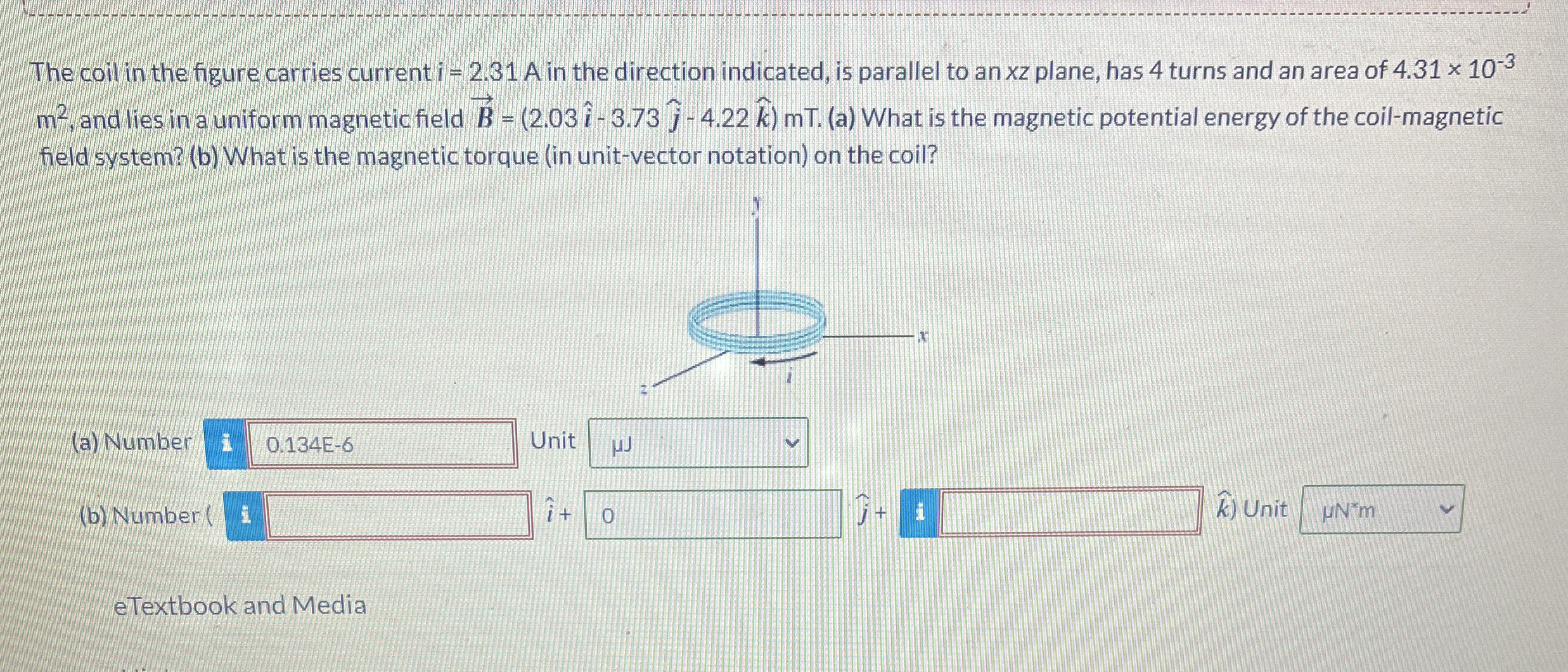 The coil in the figure carries current i = 2 . 3