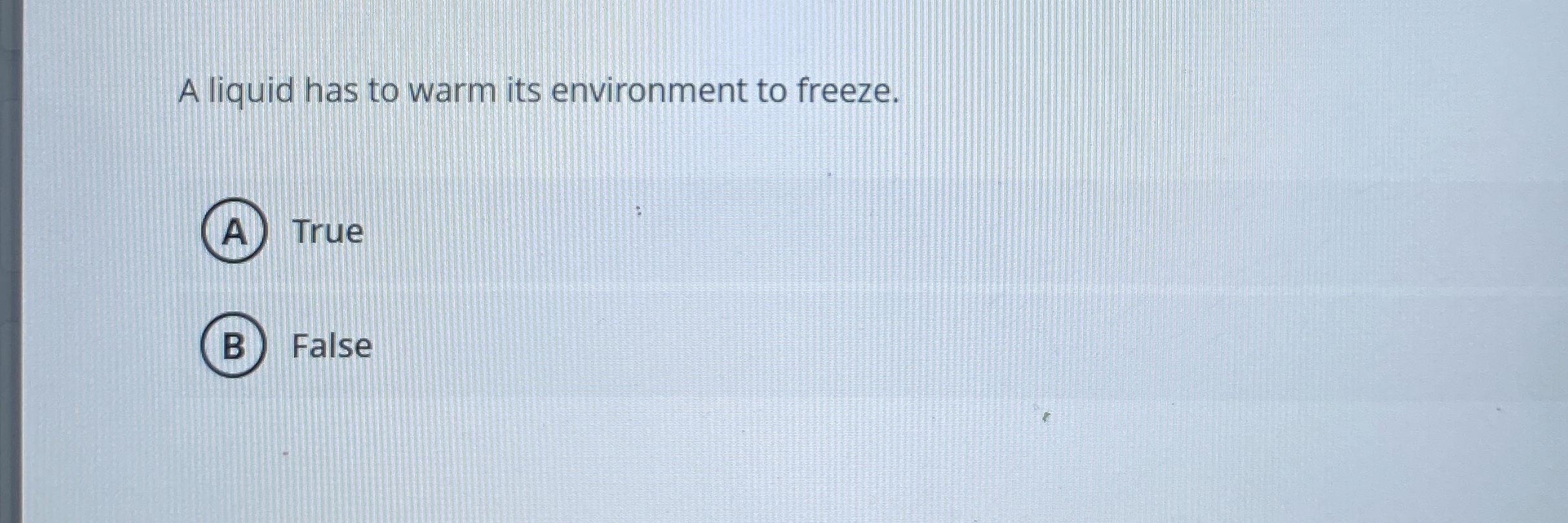 A liquid has to warm its environment to freeze.