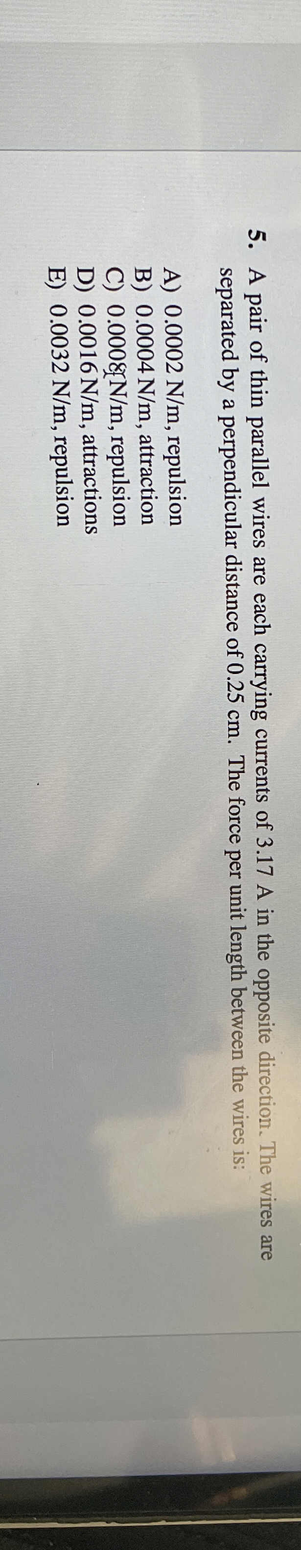 A pair of thin parallel wires are each carrying