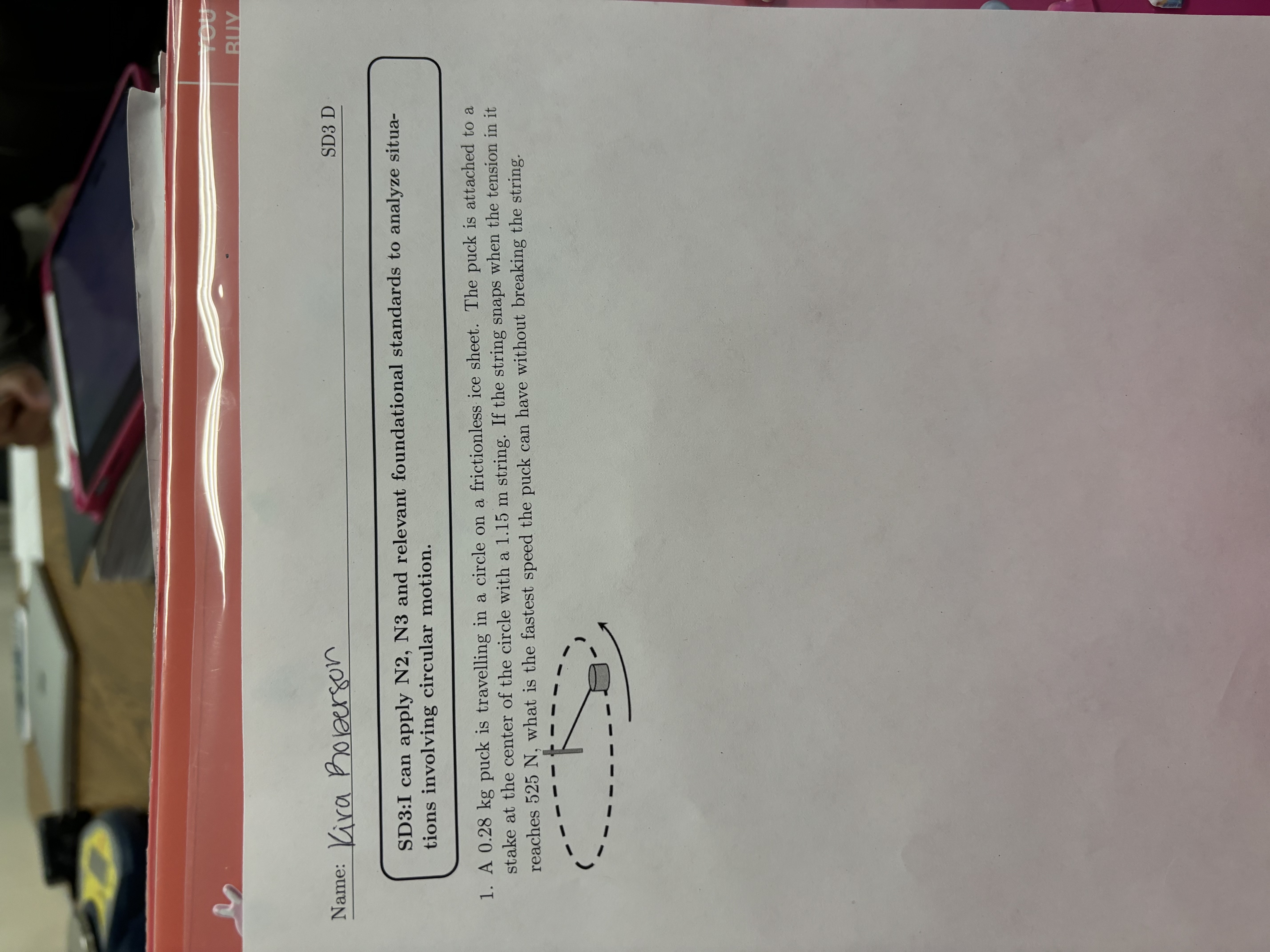 A 0 . 2 8 kg puck is travelling in a circle on a