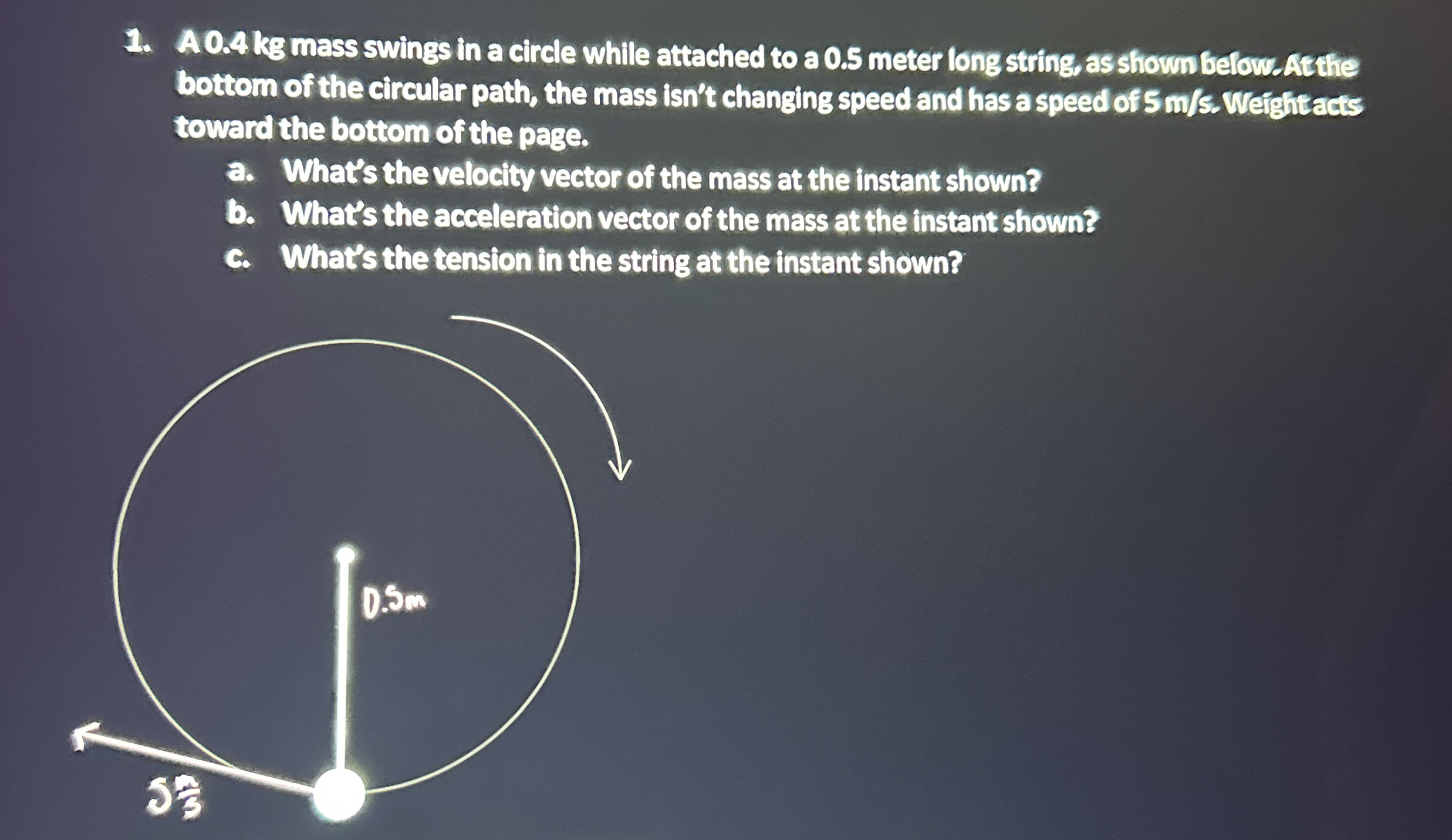 A 0 . 4 kg mass swings in a circle while attached