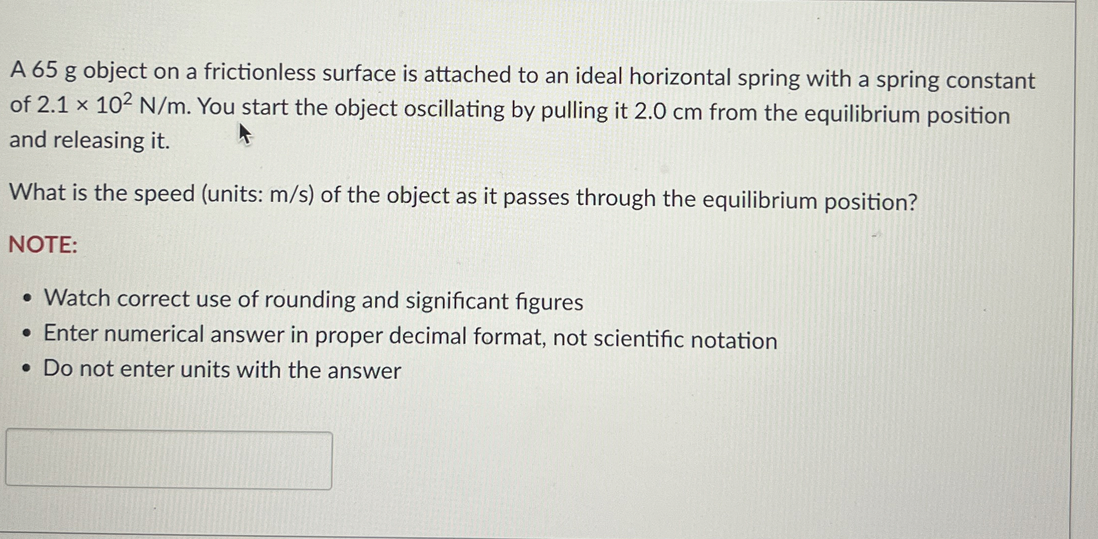 A 6 5 g object on a frictionless surface is