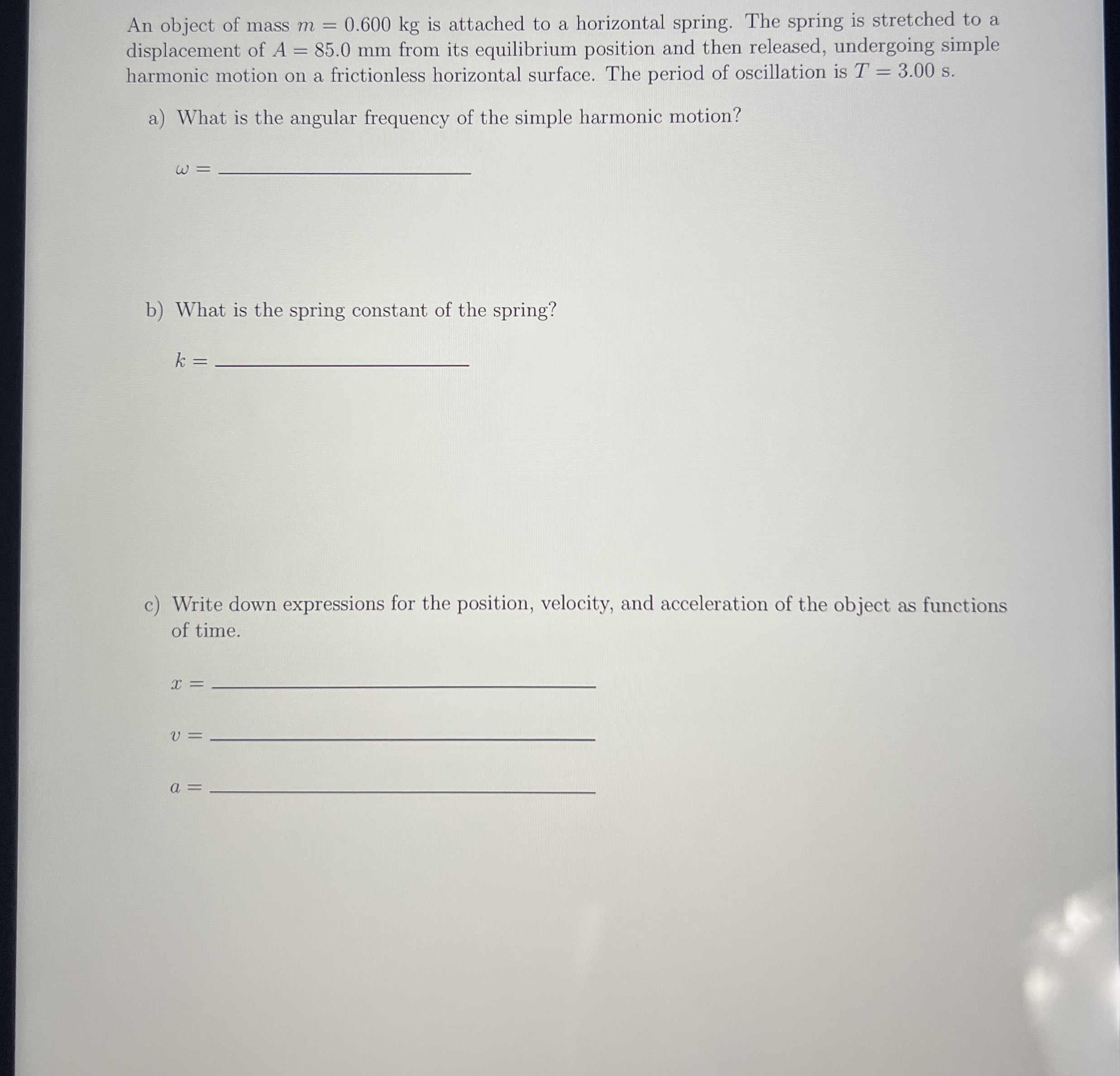 An object of mass m = 0 . 6 0 0 k g is attached