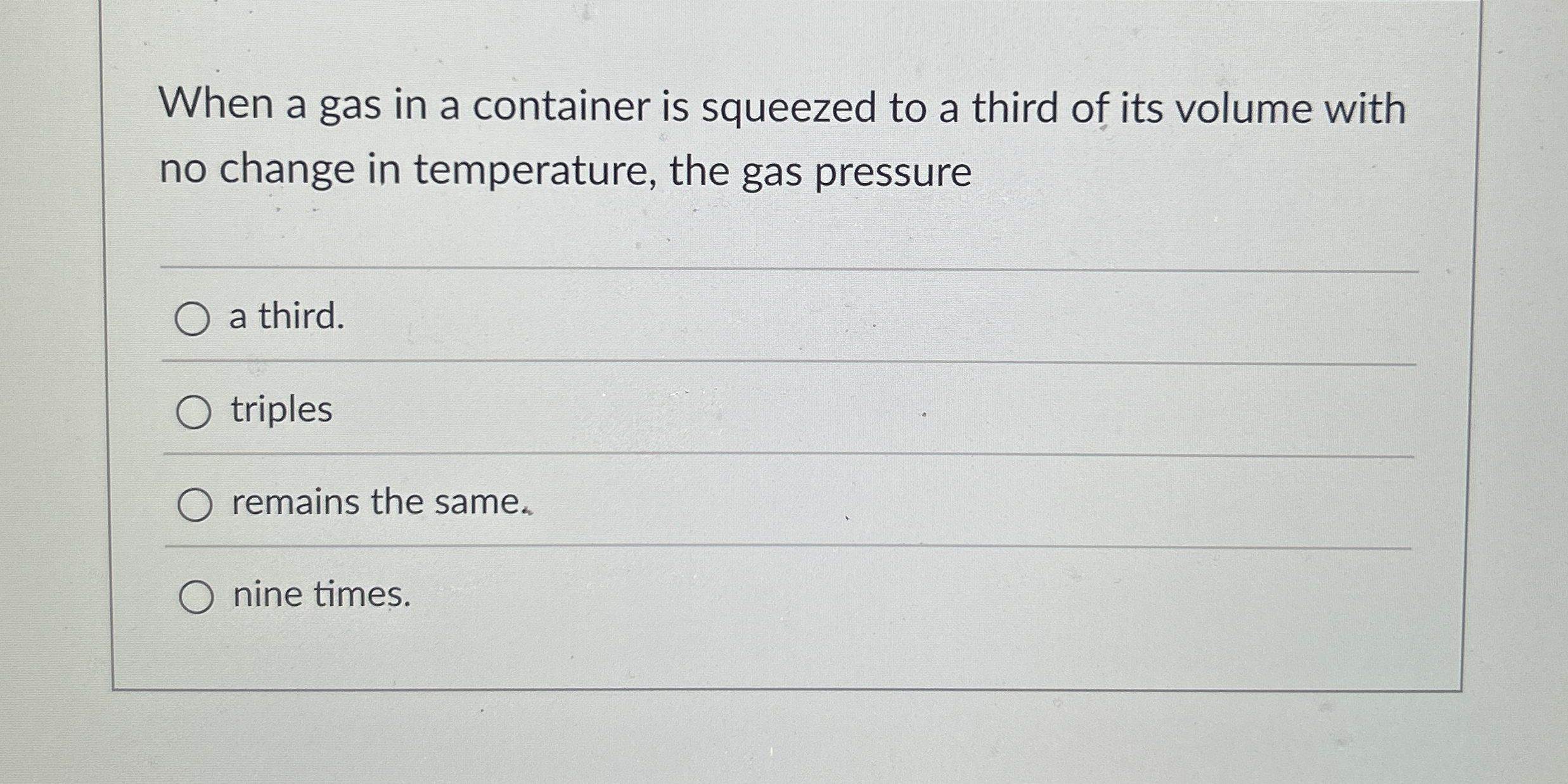 When a gas in a container is squeezed to a third