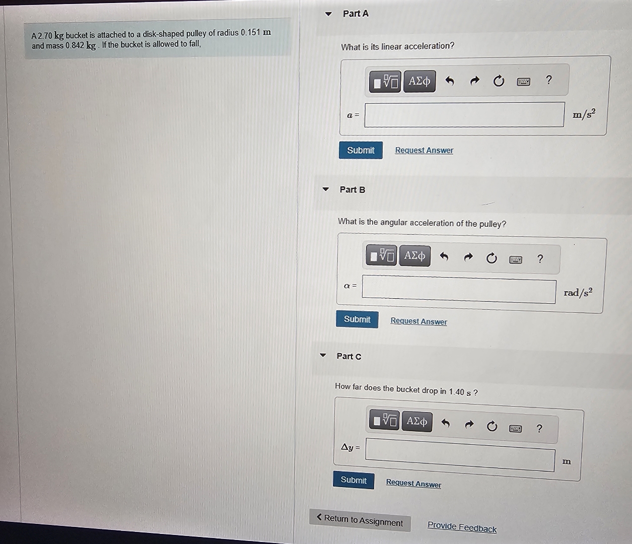 A 2 . 7 0 kg bucket is attached to a disk -