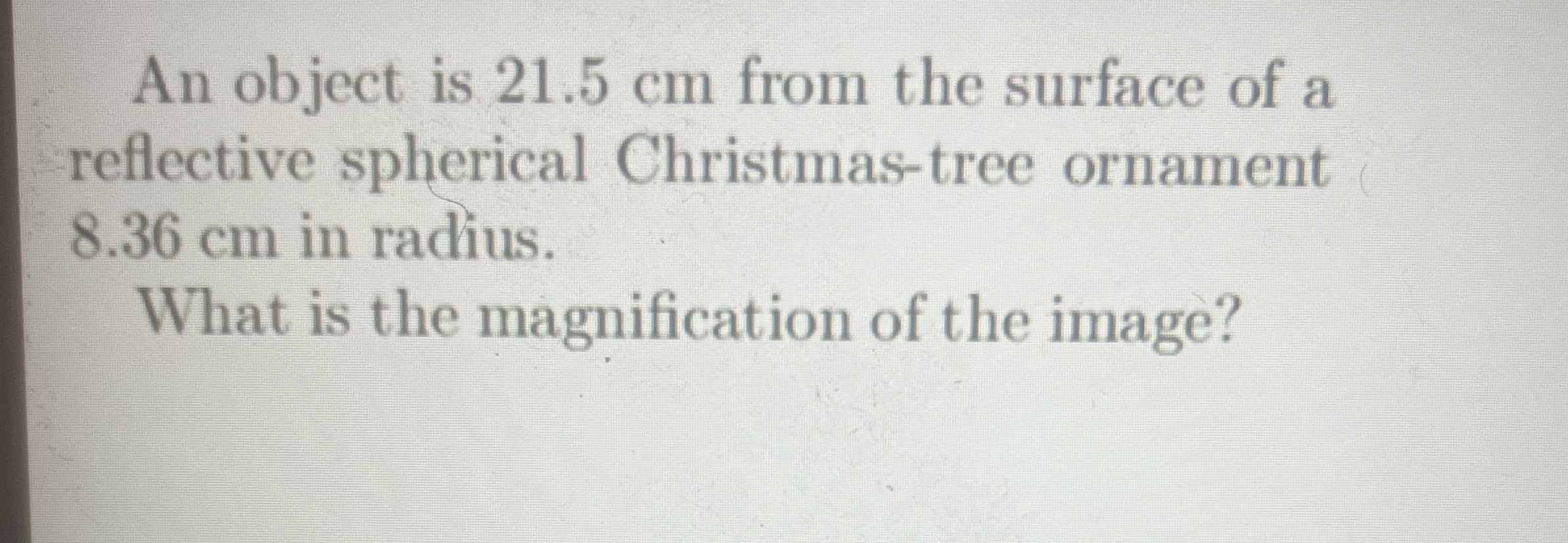 An object is 2 1 . 5 cm from the surface of a