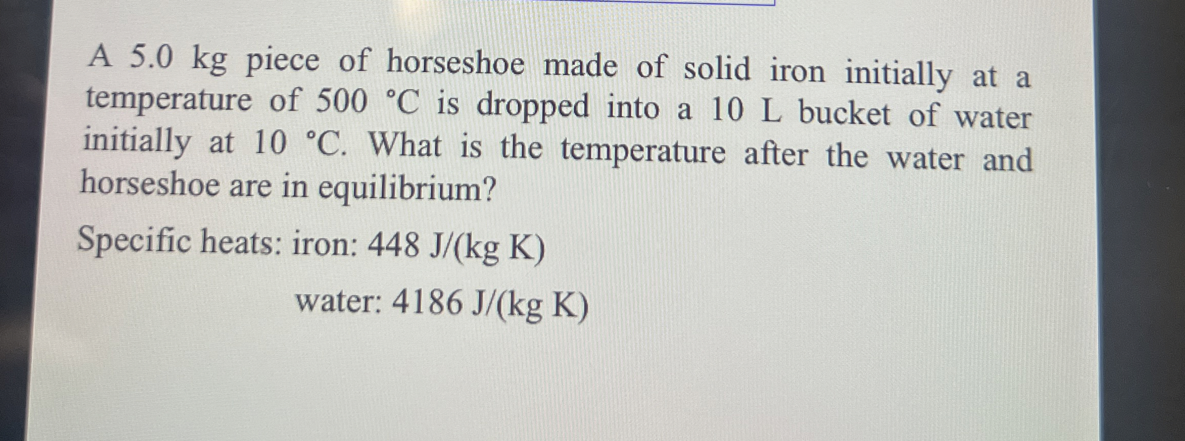 A 5 . 0 kg piece of horseshoe made of solid iron