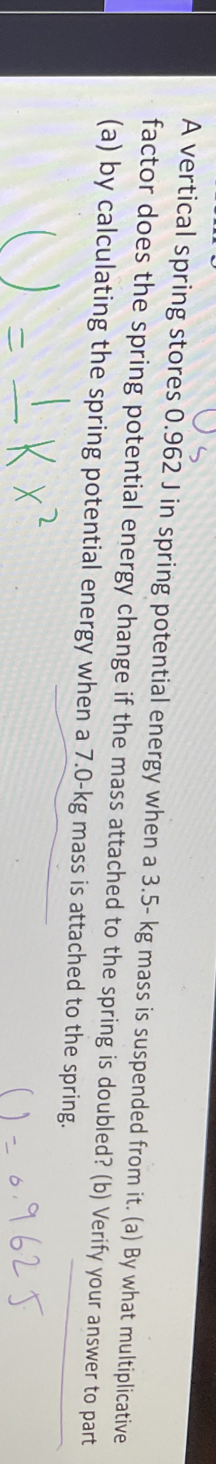 A vertical spring stores 0 . 9 6 2 J in spring