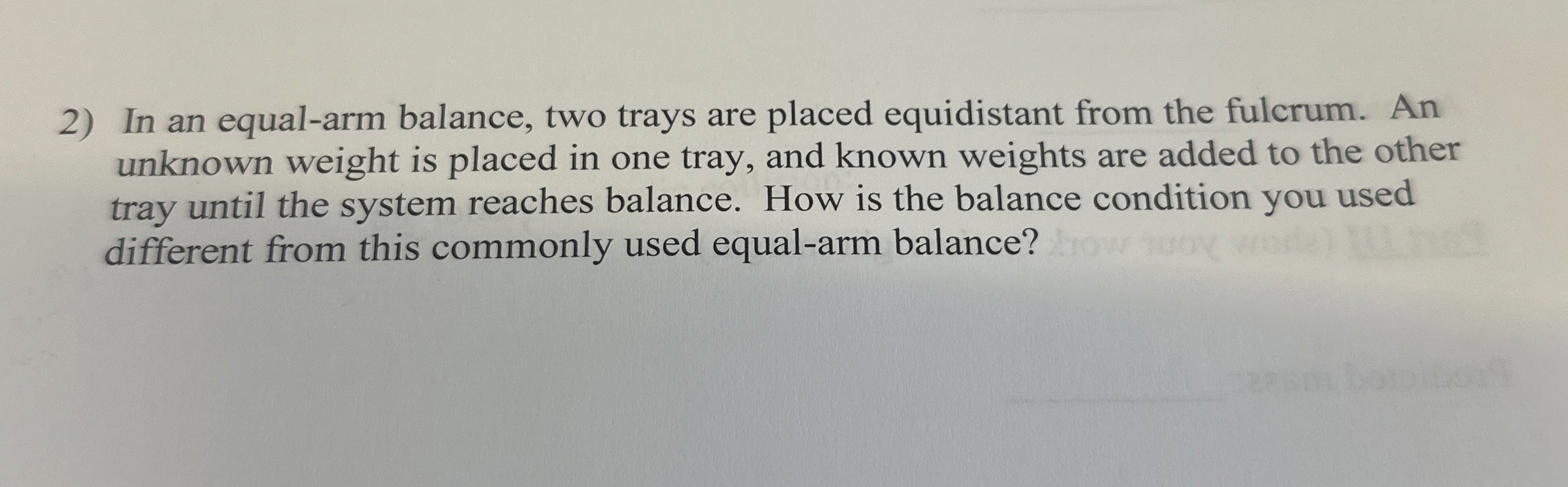 In an equal - arm balance, two trays are placed