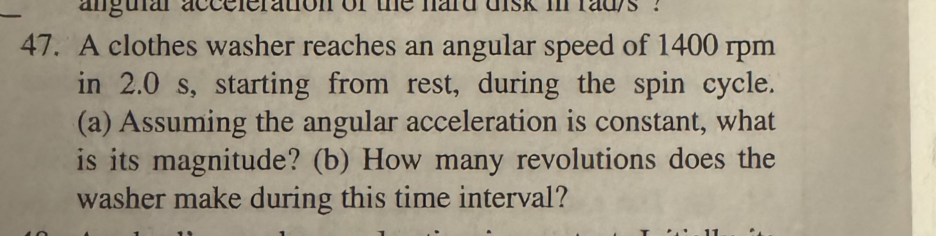 A clothes washer reaches an angular speed of 1 4
