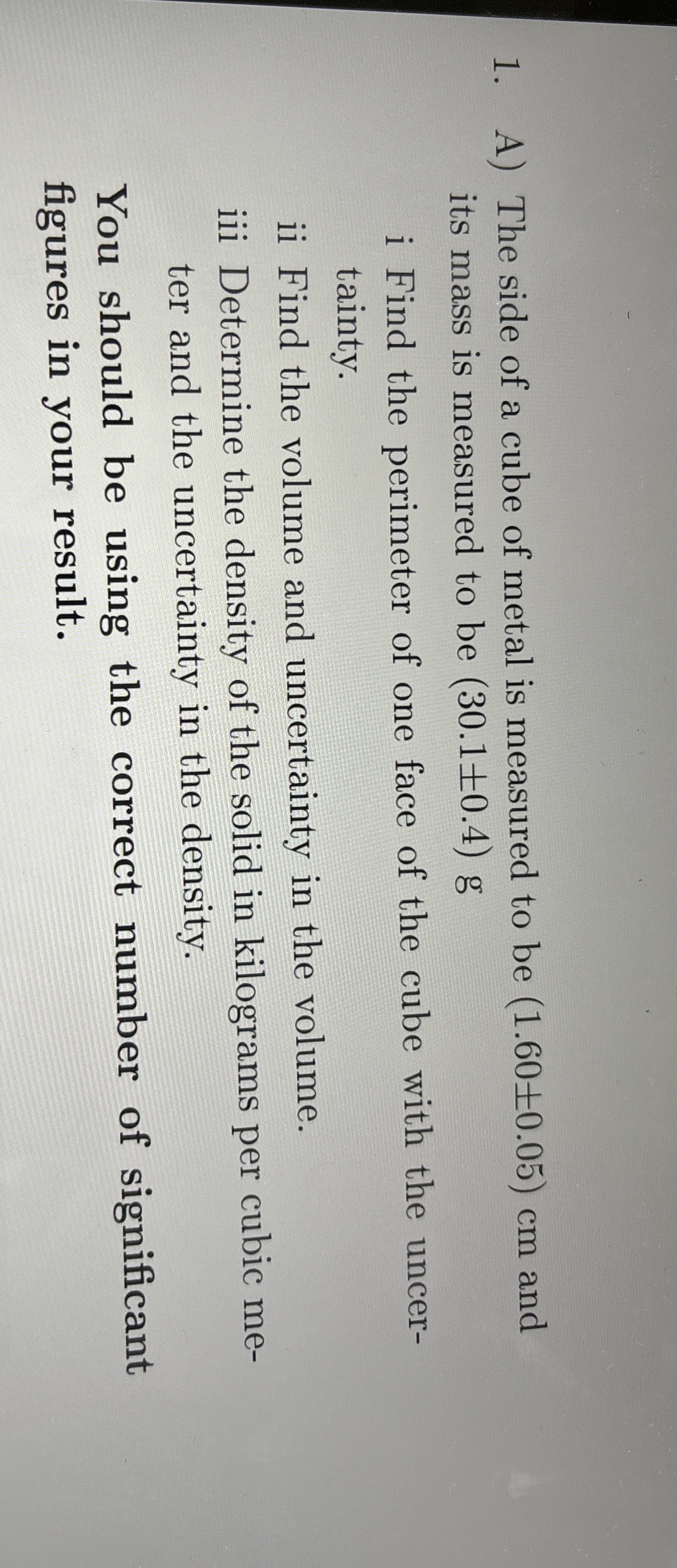 A ) The side of a cube of metal is measured to be