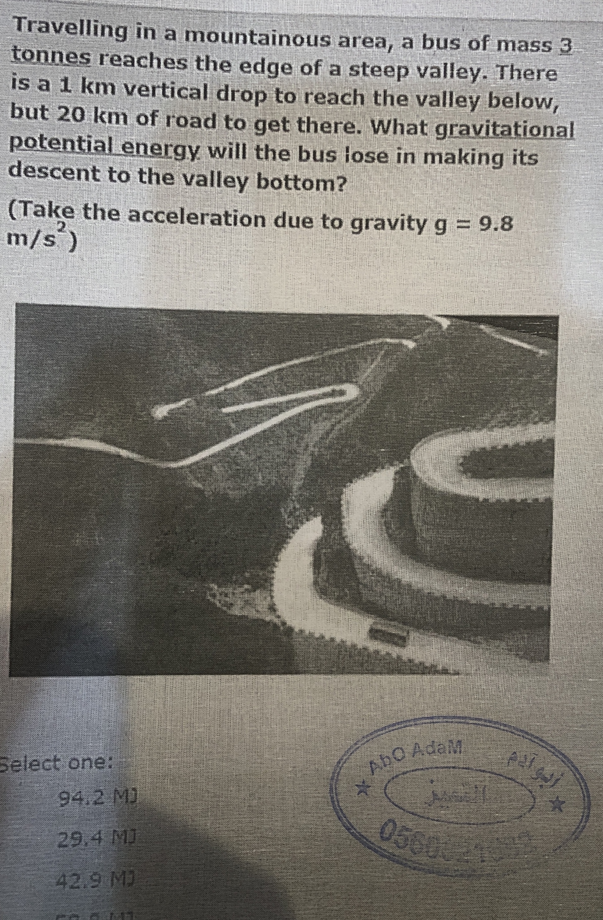 Travelling in a mountainous area, a bus of mass 3