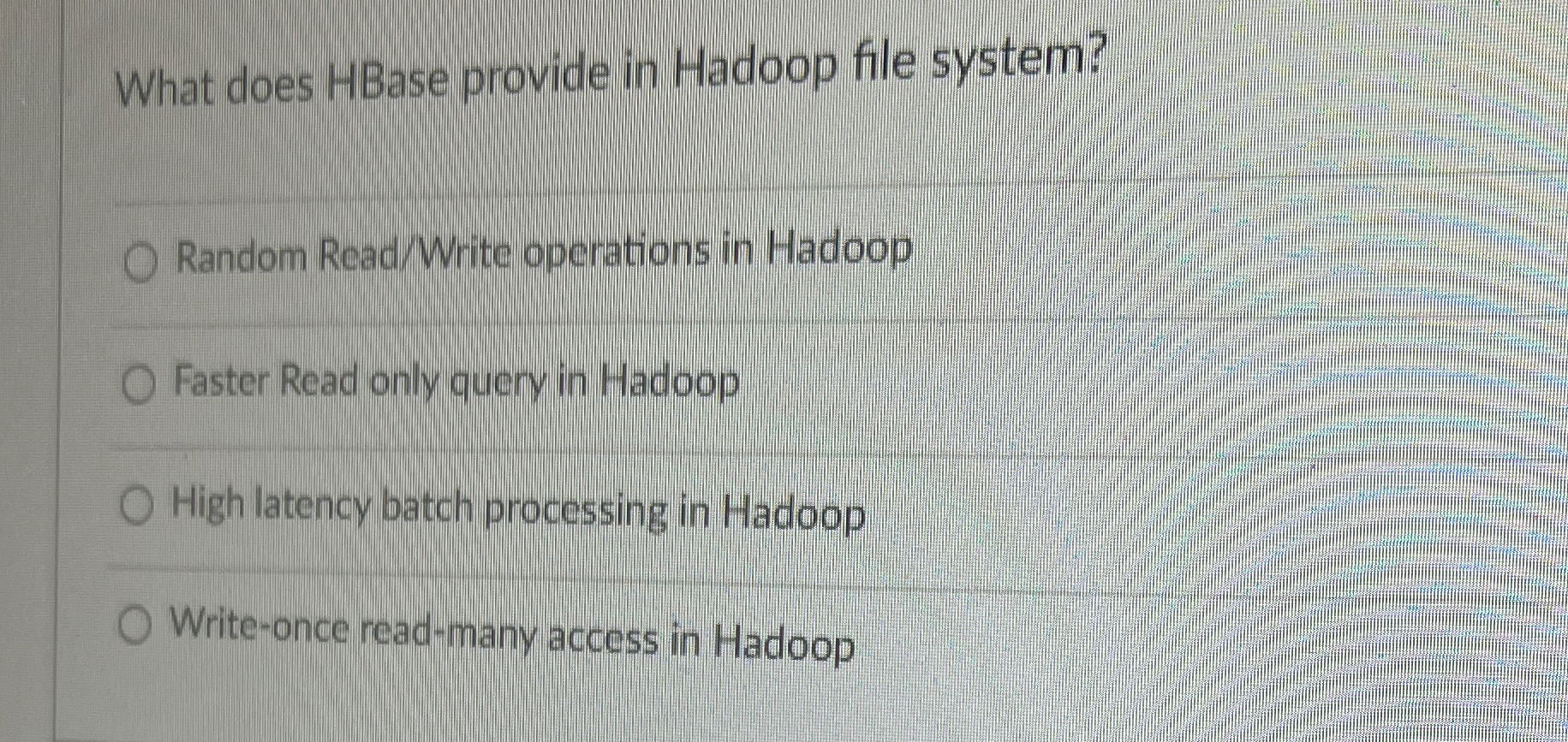 What does HBase provide in Hadoop file system?