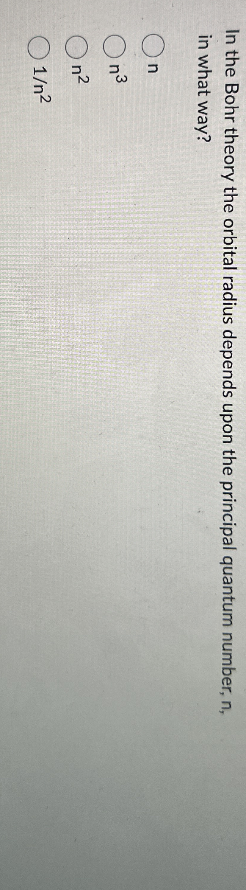 In the Bohr theory the orbital radius depends