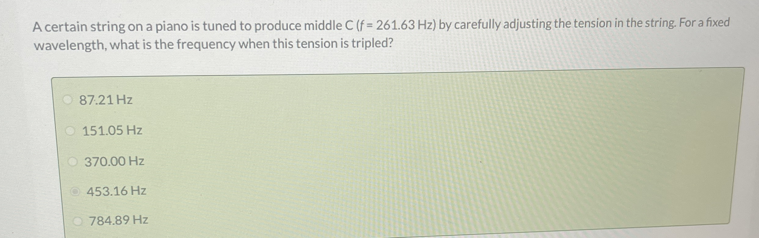 A certain string on a piano is tuned to produce