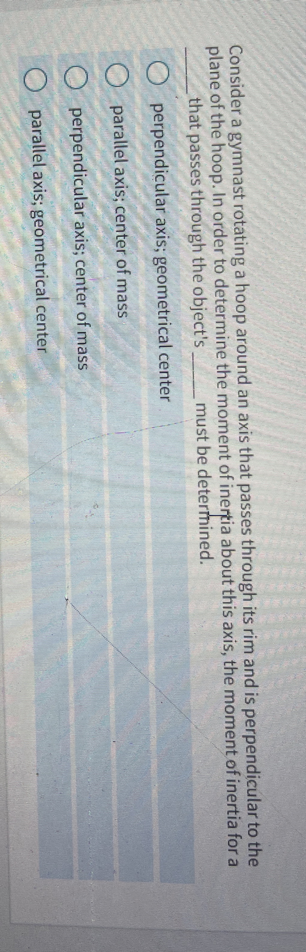 Consider a gymnast rotating a hoop around an axis