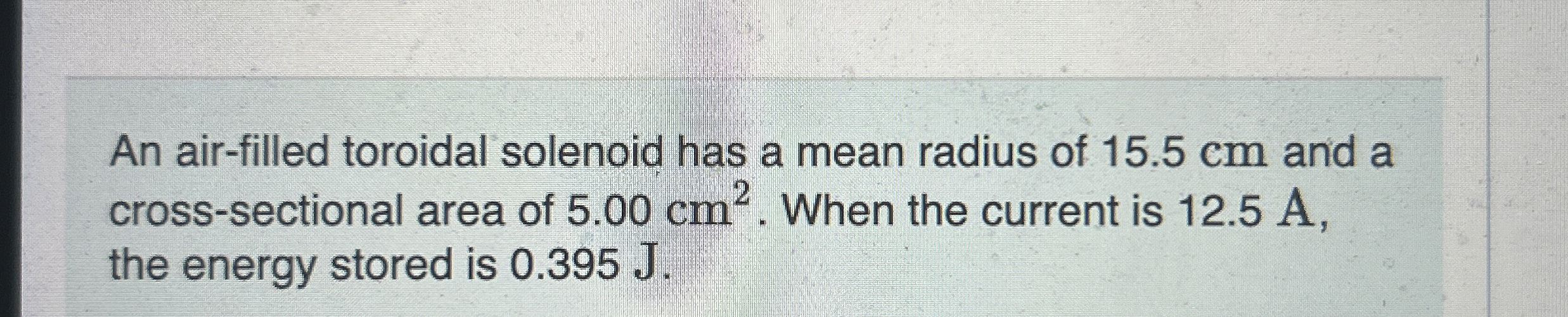 An air - filled toroidal solenoid has a mean